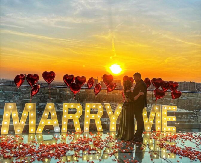 Wedding proposal on the building roof